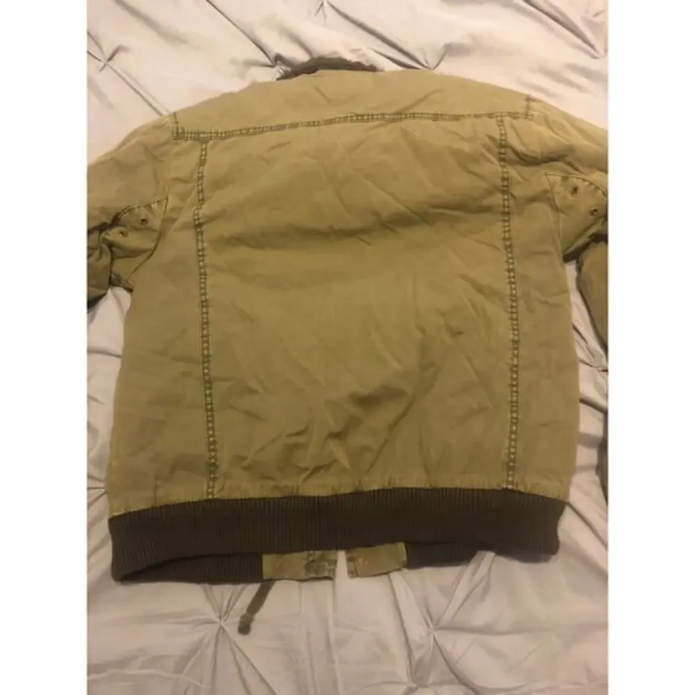 Olive green jacket‎ size L
